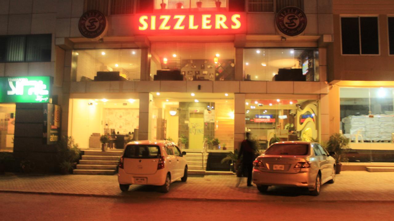 Divine Hotel Rawalpindi Bagian luar foto